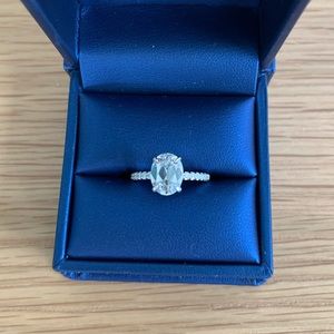 Moissanite & Co engagement ring. VS quality diamonds on sides. 4.75 size.